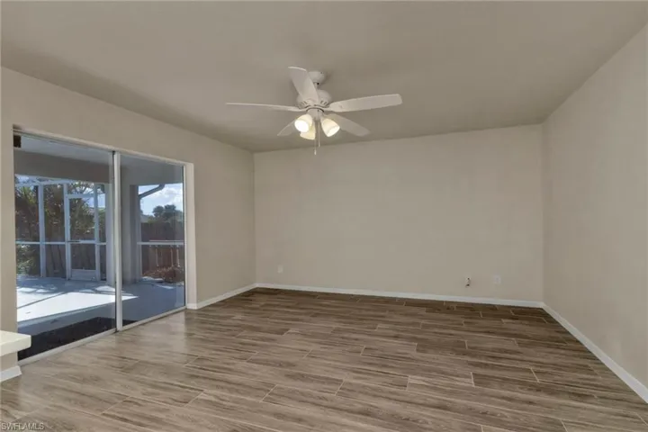 Unfurnished room featuring ceiling fan