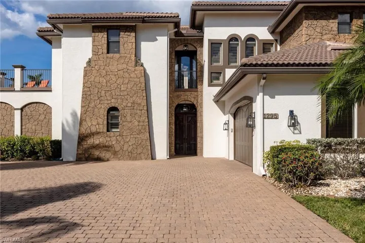 Mediterranean / spanish-style house with a balcony