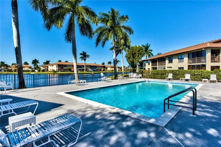 Sparking pool with relaxing lake view is a great place to watch the sunset