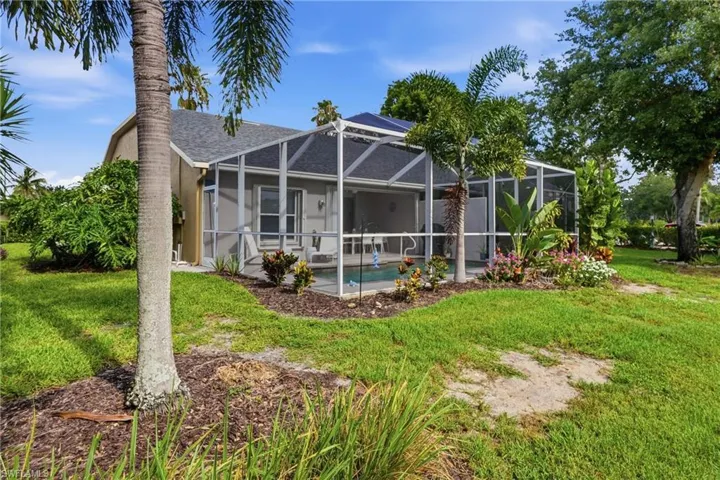 Screened lanai featuring a swimming pool and concrete patio