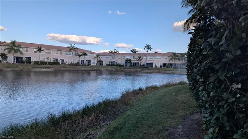 Water view featuring nearby suburban area