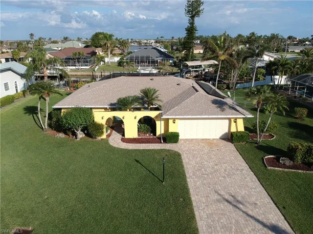 Beautiful Landscaping and Paved Driveway