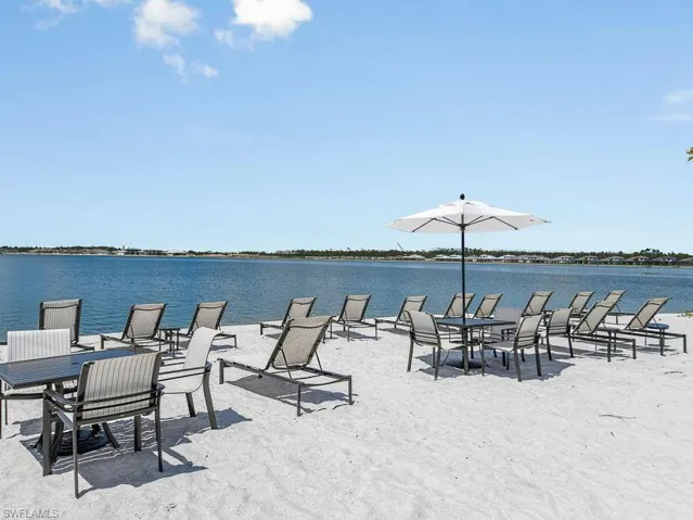 View of patio with a water view