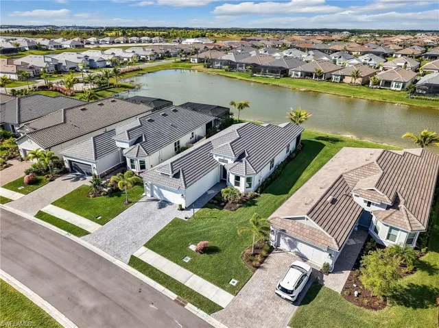 Aerial view of residential area with a nearby body of water