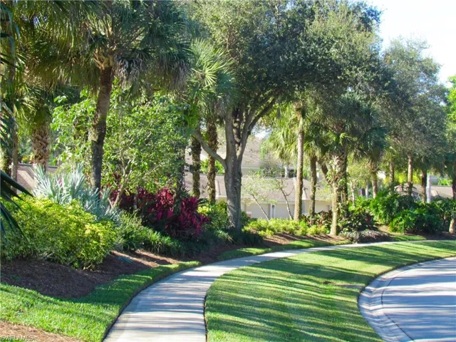 Lush landscaping and sidewalks throughout neighborhood