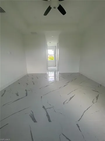 Unfurnished room with ceiling fan
