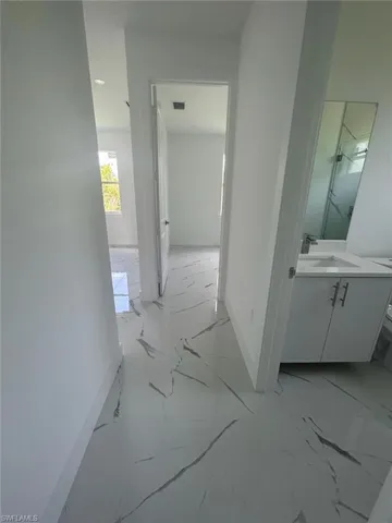 Hallway with sink