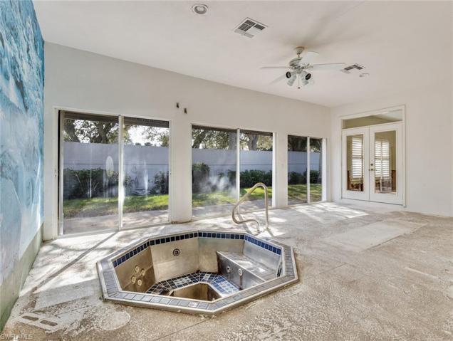 Enclosed patio with spa