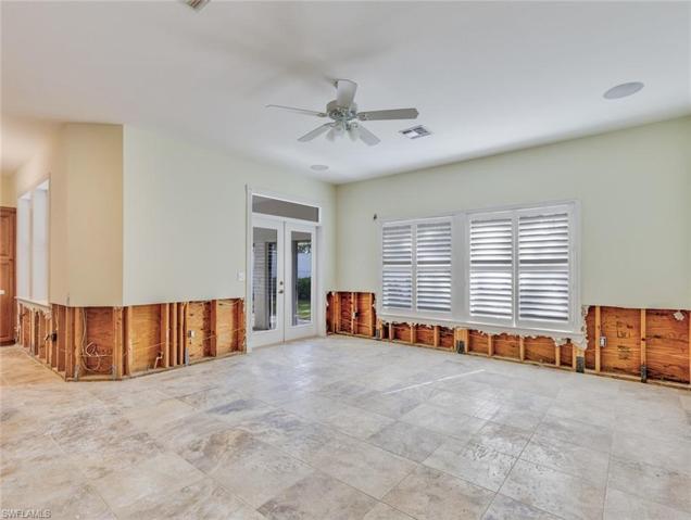 Family room to enclosed patio and spa