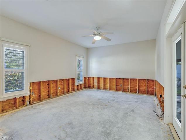 Master bedroom with doors to enclosed patio and spa