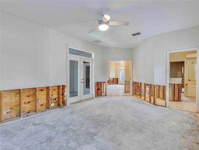 Bedroom to patio doors, hall, and master bath on right