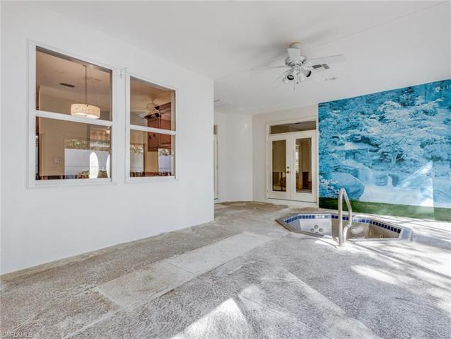Enclosed patio with spa
