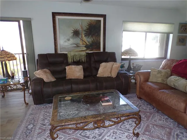Living room with wood finished floors