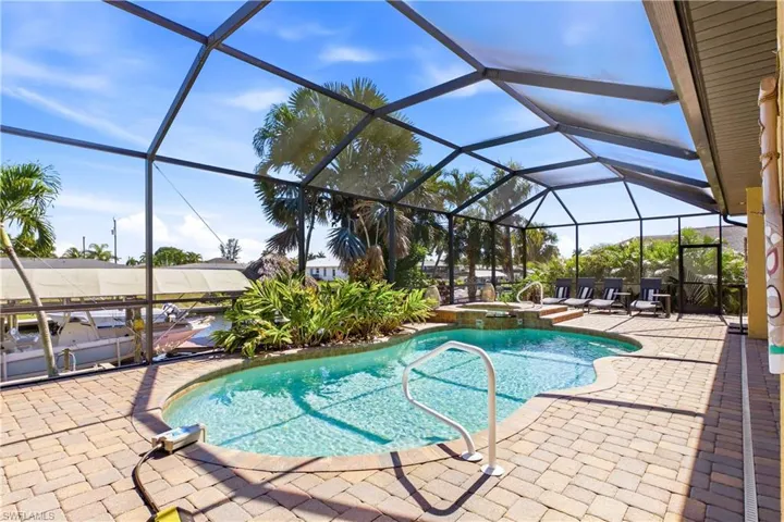 Step outside into your PRIVATE TROPICAL OASIS where INDOOR & OUTDOOR LIVING blend seamlessly