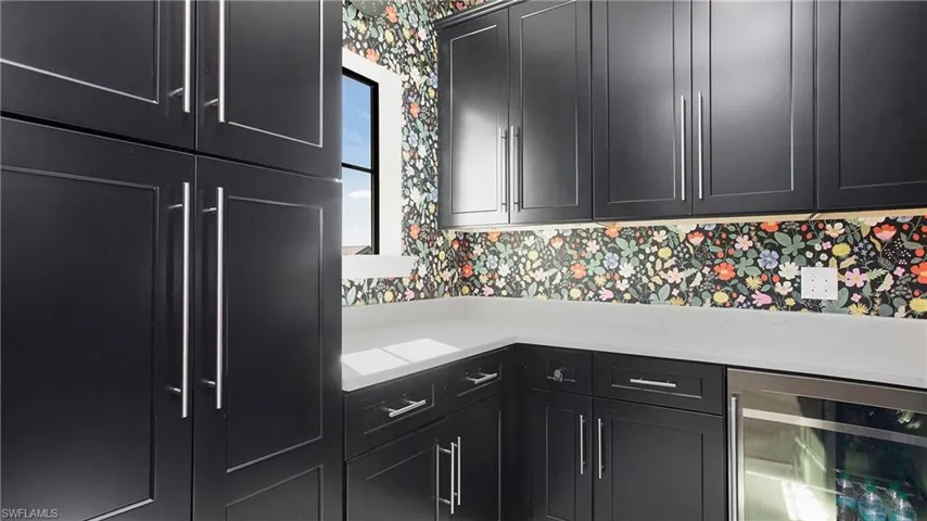Kitchen with beverage cooler