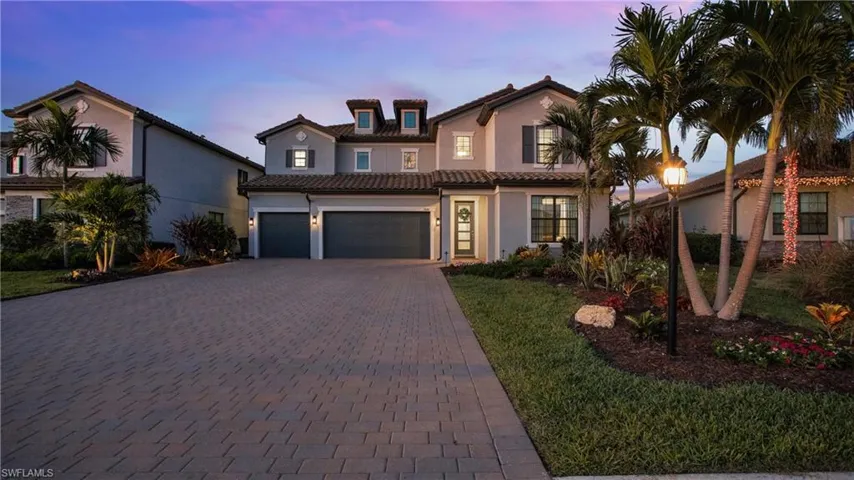 Mediterranean / spanish-style home featuring a garage