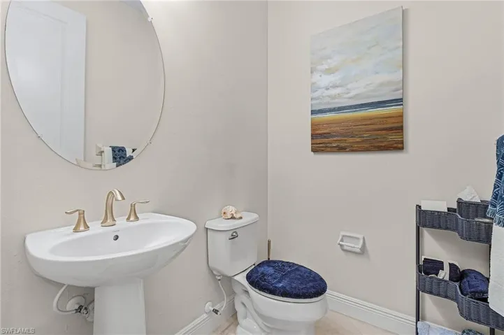 Bathroom with tile flooring and toilet