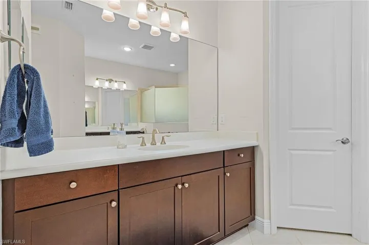 Bathroom with tile floors and vanity