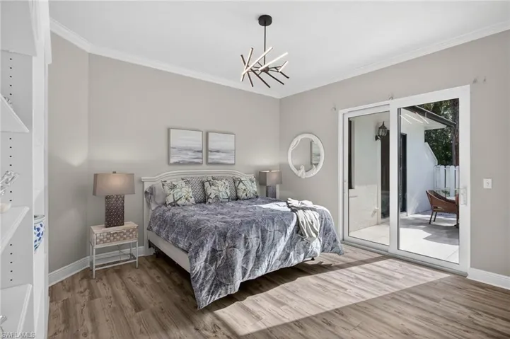 Bedroom #3 located on the east wing, with sliders out to the side open lanai!