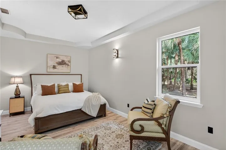 Bedroom #5 located on the north wing of the house. Separate and was previously used as a theater room.