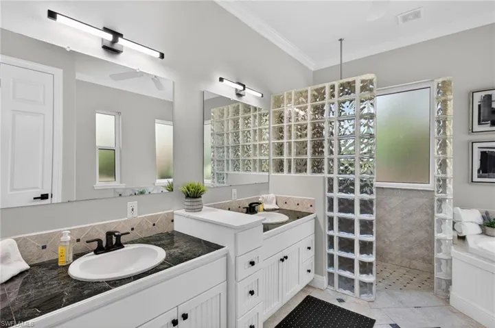 Dual sinks, walk in shower, and soaker tub!