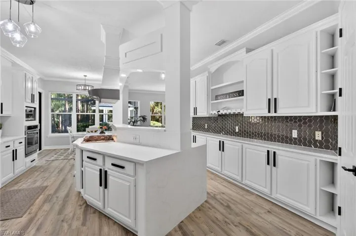 Stunning kitchen, lighting, backsplash!