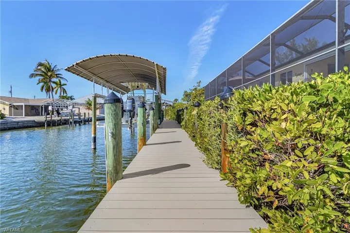 Composite dock and 13,000# covered boat lift.