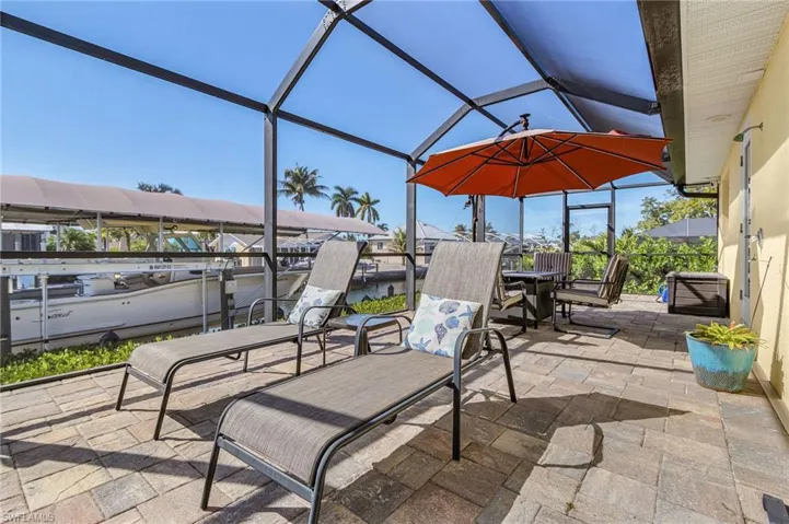 The screened lanai has plenty of room for entertaining.