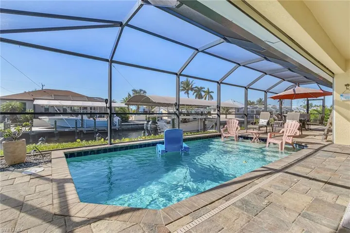 Screened Pool with sun shelf.