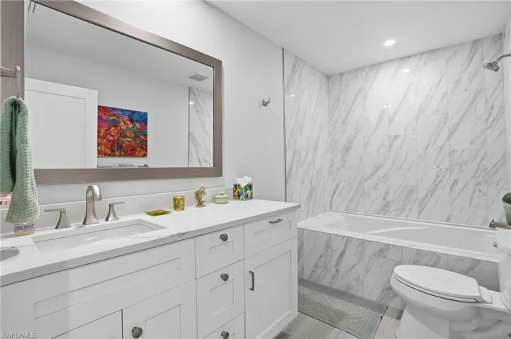 third full bath with large tub