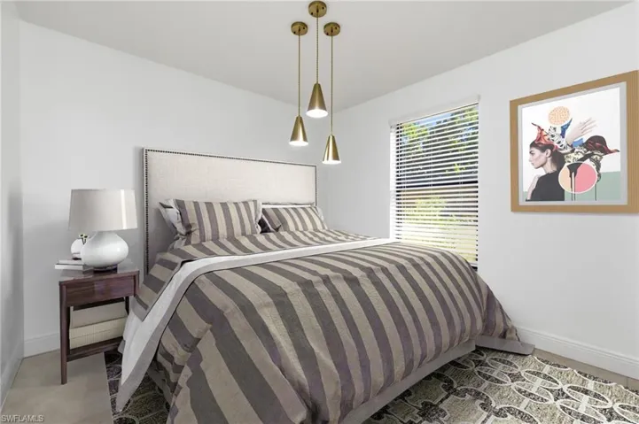 Bedroom with baseboards