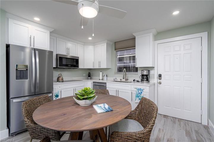 The fully stocked eat-in kitcken is ready to host and impress any guest. It boasts new appliances including a convection stove, refrigerator, dishwasher, and microwave.