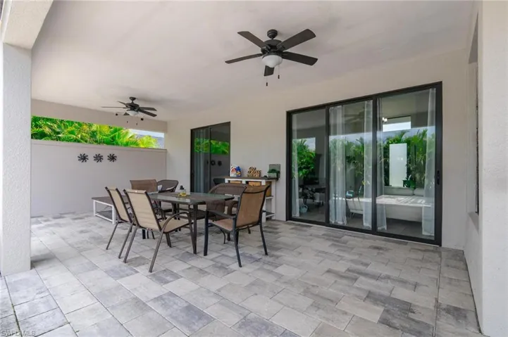 View of patio with ceiling fan