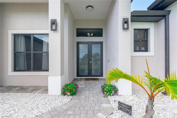 View of exterior entry with french doors