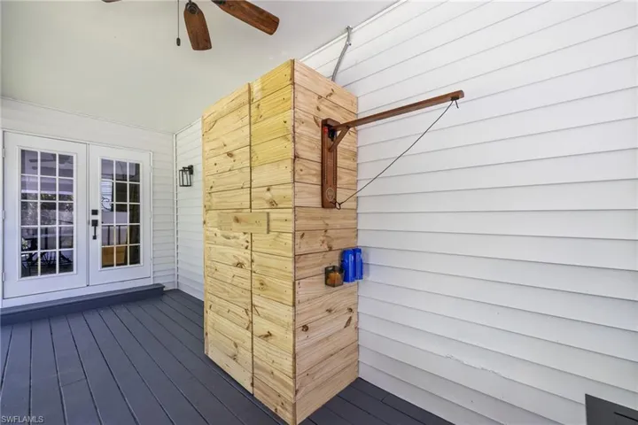 Wooden deck featuring french doors