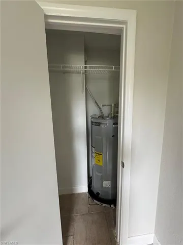 Utility room with electric water heater