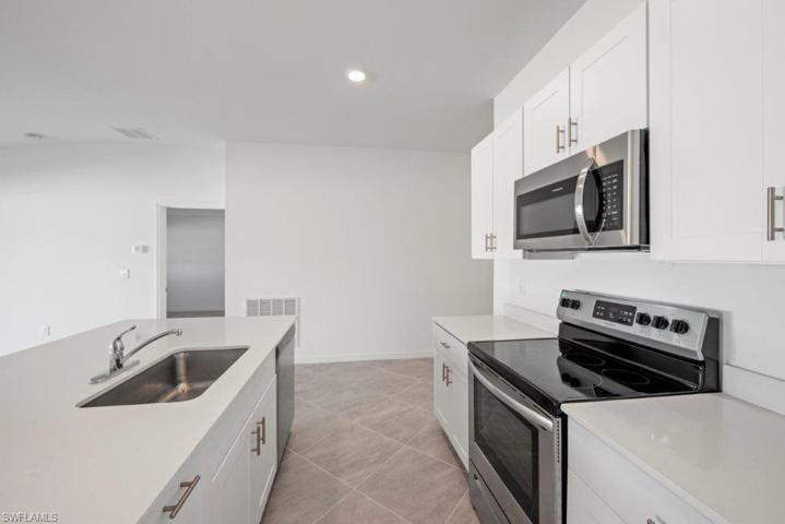 414  Picturesque  AVE, LEHIGH ACRES, FL 33974