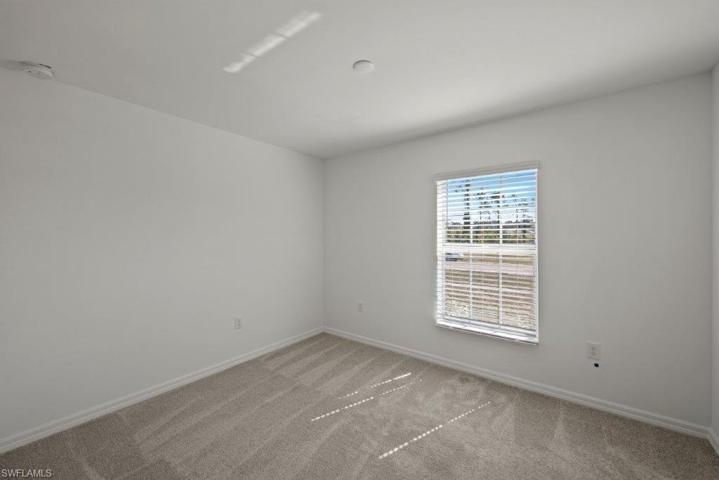 414  Picturesque  AVE, LEHIGH ACRES, FL 33974