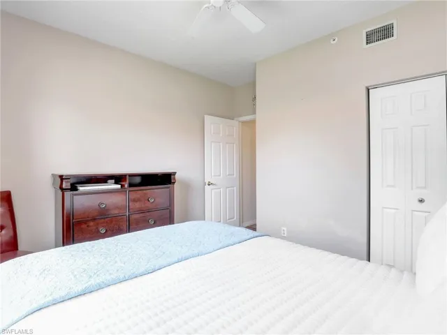 Bedroom featuring a closet and ceiling fan
