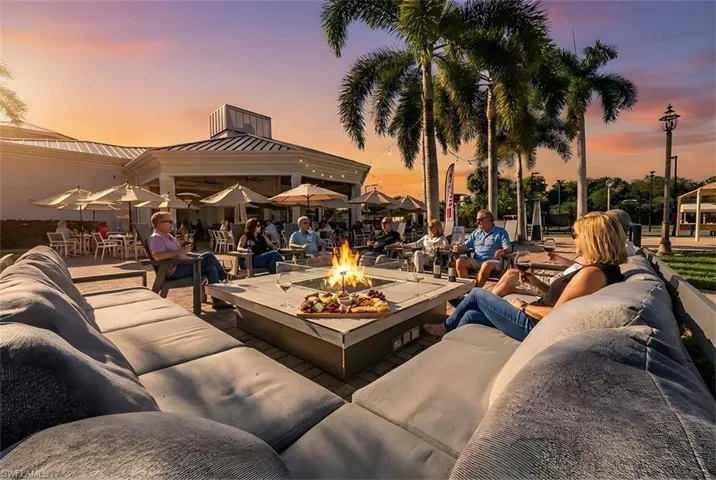 View of patio / terrace featuring an outdoor living space with a fire pit and a gazebo