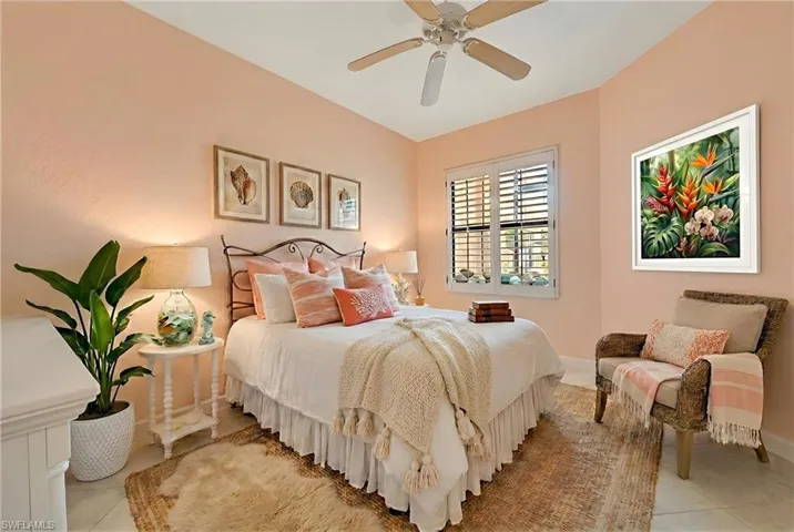 Bedroom featuring ceiling fan and light tile patterned floors