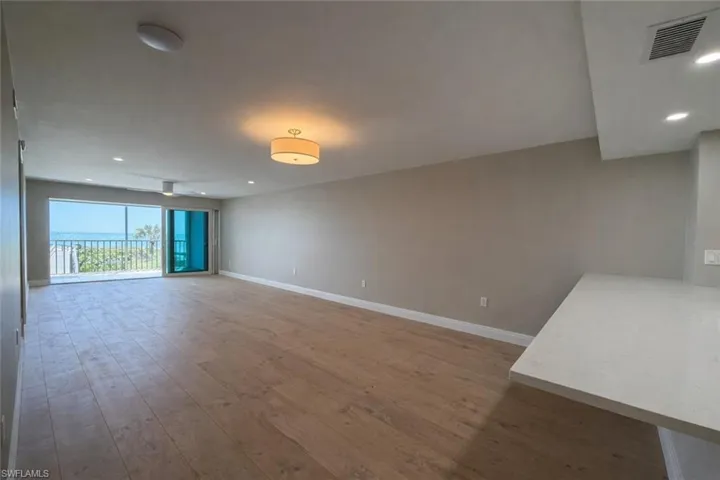 Unfurnished living room featuring recessed lighting and light wood-style flooring