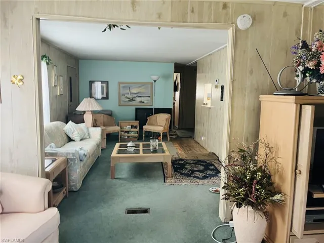 Sitting room with carpet floors