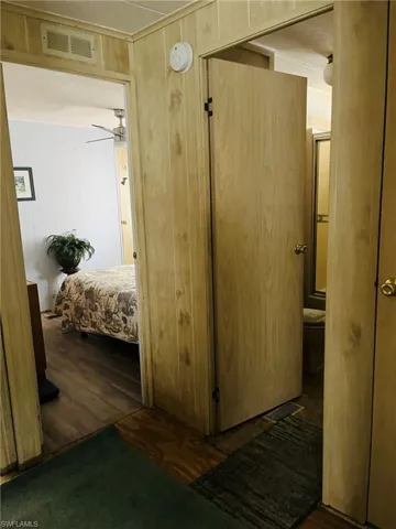 Bedroom with wood finished floors