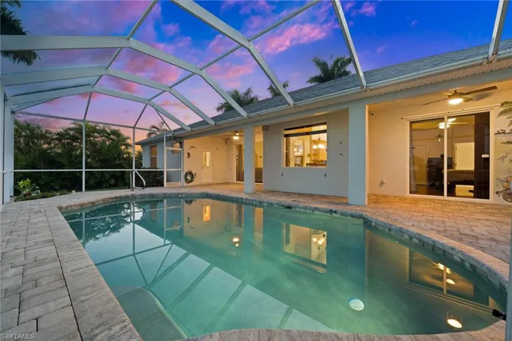 Pool and Covered Lanai. Lot's of room to entertain.