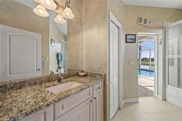 Main Bathroom with tub/shower. Pool Bathroom