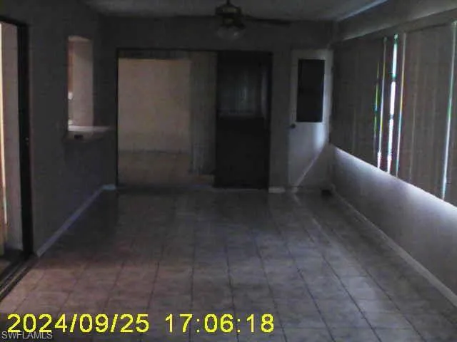 View of tiled spare room