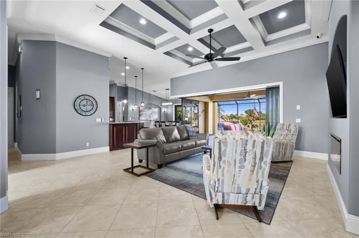 Family room with view of the patio and kitchen