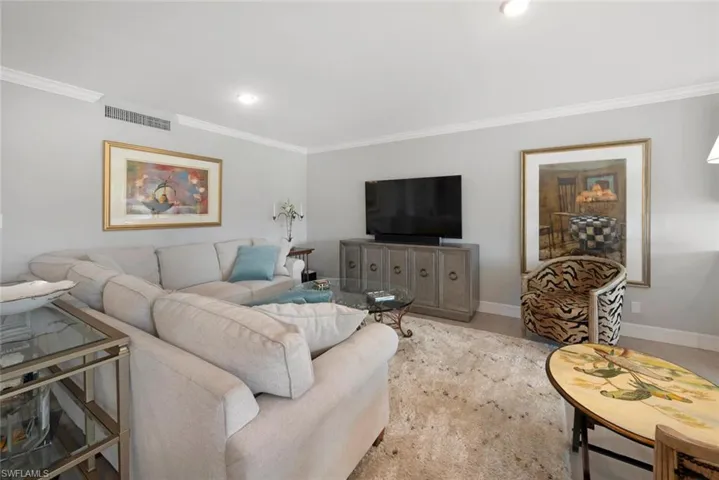 Living room with ornamental molding