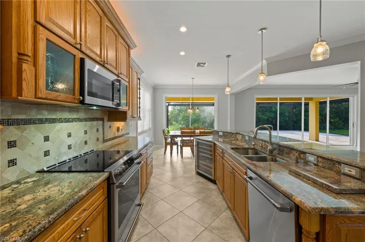 New top of the line Cafe Stainless appliances and Wine Cooler